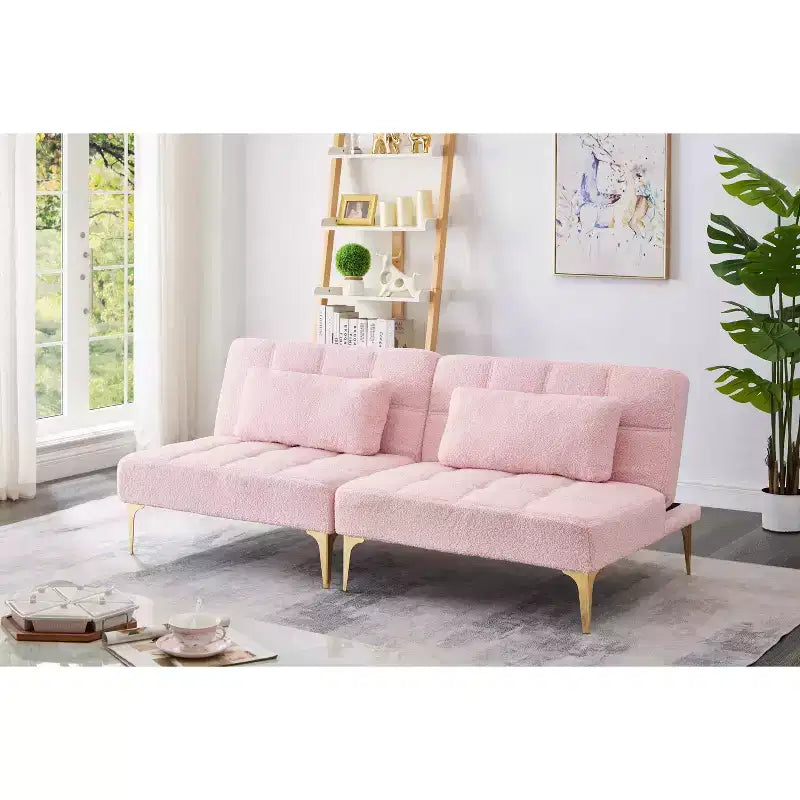 Comodo divano futon in tessuto Teddy con gambe in metallo dorato, schiuma e molle per soggiorno, rosa